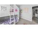 bedroom with playful bunk beds featuring playhouse aesthetic and carpeted floors at 104 Federal Path, Temple, GA 30179