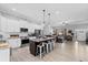 Modern kitchen featuring a large center island, stainless steel appliances, and an open concept design at 104 Federal Path, Temple, GA 30179