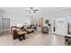 Spacious living room featuring ample seating and natural light from a large window at 104 Federal Path, Temple, GA 30179