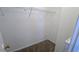 Walk-in closet with carpeted floor and wire shelving offers ample storage space at 1780 Spring Hill Cv, Lithonia, GA 30058