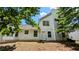 Exterior view of the home showcasing the backyard and architectural details at 1780 Spring Hill Cv, Lithonia, GA 30058