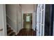 Inviting entryway with hardwood floors and staircase at 1780 Spring Hill Cv, Lithonia, GA 30058