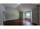 Spacious living room featuring vaulted ceiling and windows at 1780 Spring Hill Cv, Lithonia, GA 30058