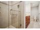 Bathroom features a glass enclosed shower with modern fixtures and separate toilet area at 3932 Granger Dr, Brookhaven, GA 30341