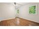 Bedroom with hardwood floors and natural light at 3932 Granger Dr, Brookhaven, GA 30341