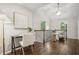 Upstairs landing area with desk and chair with space for a sitting area at 3932 Granger Dr, Brookhaven, GA 30341