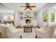Comfortable living room with fireplace, built-in shelves, and plenty of seating for relaxation at 3932 Granger Dr, Brookhaven, GA 30341