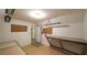 Finished attic featuring painted walls, work benches, and vinyl flooring at 4703 Waverly Walk, Douglasville, GA 30135