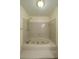 Bright Bathroom featuring a bathtub with jets, tiled floor and walls at 4703 Waverly Walk, Douglasville, GA 30135