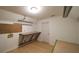 Bonus room featuring a laminate floor and a built-in work table at 4703 Waverly Walk, Douglasville, GA 30135