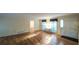 Inviting living room featuring hardwood floors, natural light, and a welcoming atmosphere at 4703 Waverly Walk, Douglasville, GA 30135