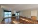 Comfortable living room featuring hardwood floors, a fireplace, and view of the outdoors at 4703 Waverly Walk, Douglasville, GA 30135