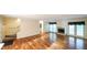 Bright living area with hardwood floors, a fireplace, and staircase access at 4703 Waverly Walk, Douglasville, GA 30135