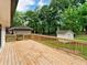 Large wooden back deck overlooking the backyard and lush mature trees at 5840 Crabapple Sw Dr, Mableton, GA 30126