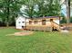 Expansive backyard with a large wooden deck, offering a great space for relaxation and outdoor activities at 5840 Crabapple Sw Dr, Mableton, GA 30126