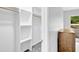 Walk in closet with custom shelving at 5840 Crabapple Sw Dr, Mableton, GA 30126