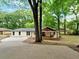 Charming single-story home with a welcoming front porch and well-maintained lawn at 5840 Crabapple Sw Dr, Mableton, GA 30126