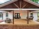 Covered front porch with rocking chair at 5840 Crabapple Sw Dr, Mableton, GA 30126