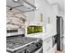 Modern kitchen with stainless steel appliances, white cabinetry, and a view from the window at 5840 Crabapple Sw Dr, Mableton, GA 30126