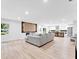 Open-concept living room and kitchen with hardwood floors and contemporary finishes throughout at 5840 Crabapple Sw Dr, Mableton, GA 30126