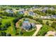 Sprawling property featuring a private pool, manicured grounds, and a picturesque neighborhood setting at 210 Tifton Ln, Roswell, GA 30075