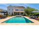 Features an inground pool, lounge seating and a dining area perfect for outdoor entertainment at 210 Tifton Ln, Roswell, GA 30075