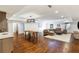 Finished basement with hardwood floors, wet bar, modern lighting and comfortable sectional sofa at 210 Tifton Ln, Roswell, GA 30075