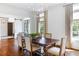 Bright dining room with hardwood floors, modern chandelier, and elegant decor for entertaining at 210 Tifton Ln, Roswell, GA 30075