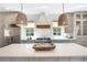 Kitchen featuring white quartz countertops, stainless steel appliances, and custom cabinets at 210 Tifton Ln, Roswell, GA 30075