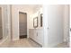 Beautiful bathroom with double vanity, white cabinets, and modern fixtures at 2381 Siskin Square Rd, Duluth, GA 30096