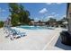 Beautiful community pool with plentiful lounge chairs and umbrellas at 2381 Siskin Square Rd, Duluth, GA 30096