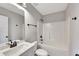 Well-lit bathroom with a shower-tub combo, toilet, and a single sink vanity at 2710 Sandy Irwin Sw Ct, Marietta, GA 30064
