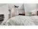 Spacious bedroom featuring neutral colors, a ceiling fan, and carpeted floors at 2710 Sandy Irwin Sw Ct, Marietta, GA 30064
