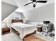 Cozy bedroom features a desk, ceiling fan, night stand and carpeted floors at 2710 Sandy Irwin Sw Ct, Marietta, GA 30064