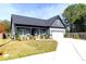 Attractive single Gathering home with a lush lawn and well maintained landscaping at 2710 Sandy Irwin Sw Ct, Marietta, GA 30064