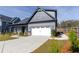 Attractive home with a clean, manicured lawn and a spacious two-car garage at 2710 Sandy Irwin Sw Ct, Marietta, GA 30064