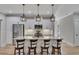 Bright kitchen featuring granite counters, stainless appliances, and pendant lighting over the island at 2710 Sandy Irwin Sw Ct, Marietta, GA 30064
