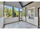 Cozy sunroom with multiple windows that provide ample natural light and a view of the outdoors at 2710 Sandy Irwin Sw Ct, Marietta, GA 30064