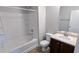 Bathroom featuring tub shower combo, toilet and vanity with sink at 3104 Leyland Ct, Decatur, GA 30034