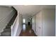 Inviting entryway featuring hardwood floors, stairs to the upper level, and access to the living area at 3104 Leyland Ct, Decatur, GA 30034