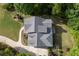 Aerial view of roof and backyard featuring a gray roof and well-kept landscaping at 313 Red Fox Dr, Canton, GA 30114
