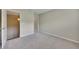 Neutral bedroom with carpet, multiple doorways, and neutral paint at 313 Red Fox Dr, Canton, GA 30114