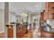 Spacious kitchen with granite countertops, breakfast bar, and seamless access to the dining area at 313 Red Fox Dr, Canton, GA 30114