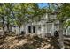 Spacious backyard patio area offering privacy with trees and fencing, providing a serene outdoor retreat at 3149 Kingswood Gln, Decatur, GA 30034