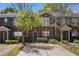 Charming brick townhome with a well-manicured front yard and ample parking space at 3149 Kingswood Gln, Decatur, GA 30034
