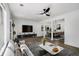 Comfortable living room with modern furnishings, including sectional sofa and entertainment center at 3149 Kingswood Gln, Decatur, GA 30034