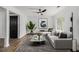 Contemporary living room featuring a comfortable sofa, modern decor, and natural light at 3149 Kingswood Gln, Decatur, GA 30034
