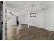 Open-concept living space with modern lighting and neutral walls and flooring at 3149 Kingswood Gln, Decatur, GA 30034