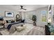 Spacious main bedroom with a ceiling fan, large window, and stylish decor at 3149 Kingswood Gln, Decatur, GA 30034