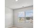 Cozy bedroom with a large window for natural light at 3573 Stonebranch Ln, Loganville, GA 30052